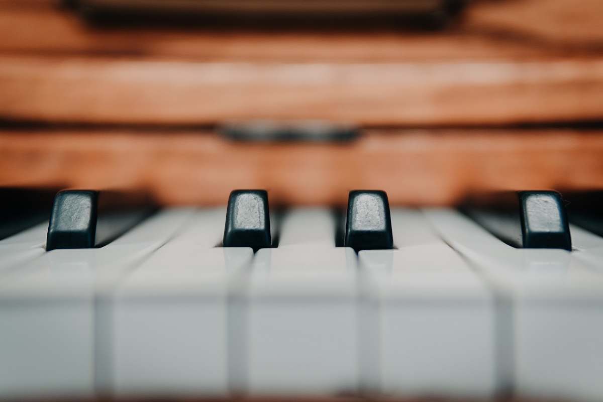 computer keyboard selective focus photography of piano keys electronics